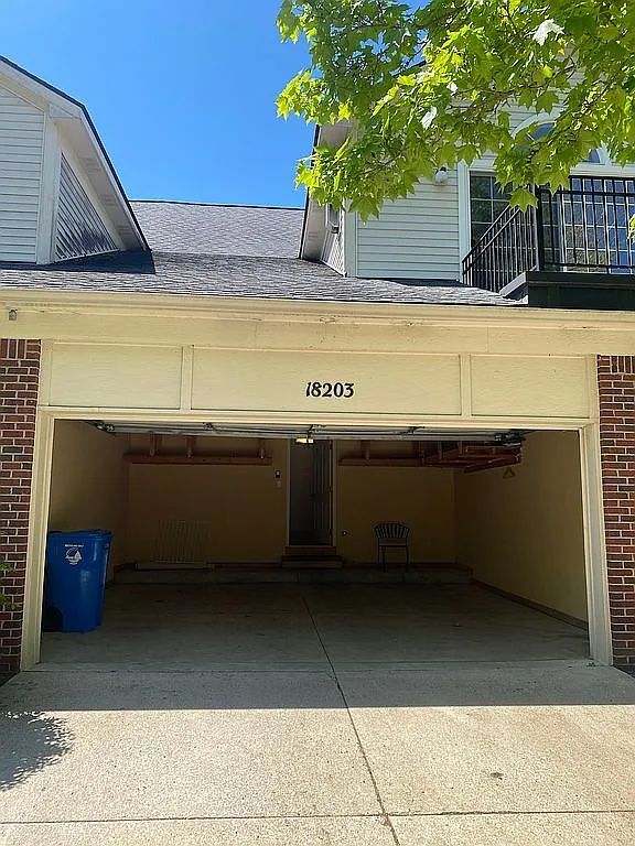 18203 Adri Cir, Walled Lake, MI 48390 - garage with driveway