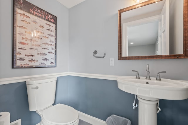 bathroom featuring toilet
