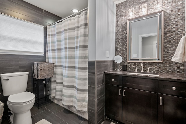 full bath featuring tile walls, tile patterned flooring, vanity, toilet, and a shower with shower curtain