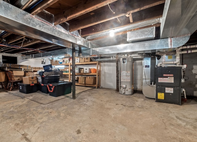 unfinished basement featuring water heater and heating unit