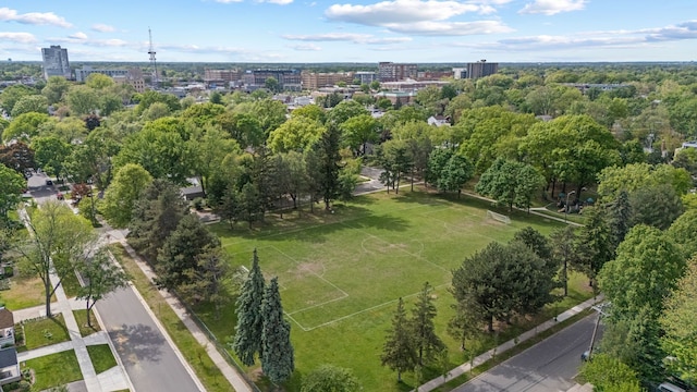 aerial view of property's location with nearby urban area