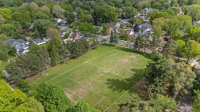 aerial overview of property's location with nearby suburban area