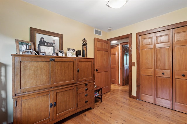 5114 N Oak Rd, Davison, MI 48423 - bedroom with light wood-style floors and a closet
