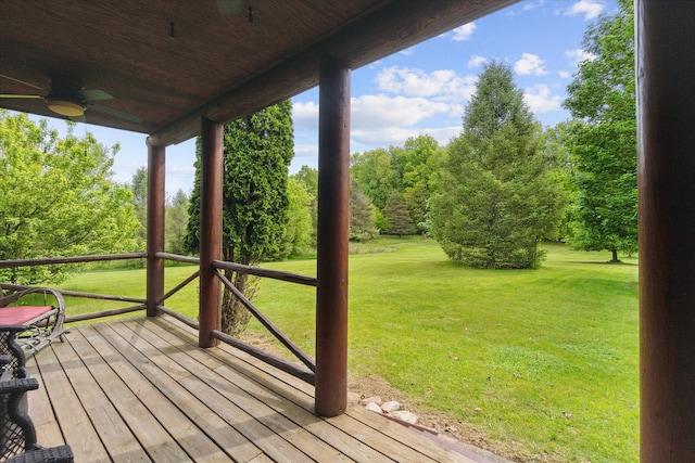 5114 N Oak Rd, Davison, MI 48423 - wooden terrace featuring a yard, a ceiling fan, and view of scattered trees