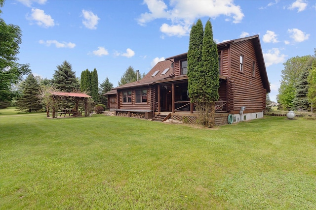 5114 N Oak Rd, Davison, MI 48423 - back of house with log siding and a yard