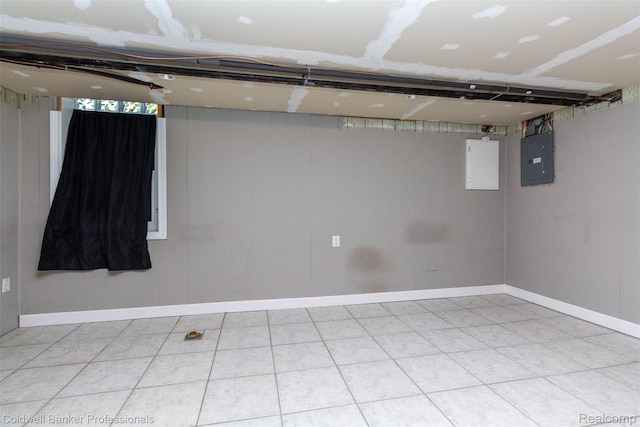 3531 Burbank Dr, Ann Arbor, MI 48105 - below grade area featuring electric panel, tile patterned flooring, and baseboards