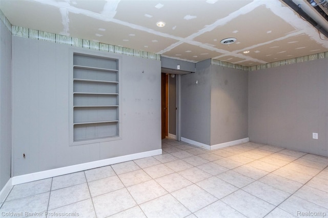 3531 Burbank Dr, Ann Arbor, MI 48105 - spare room with built in features, tile patterned floors, and baseboards
