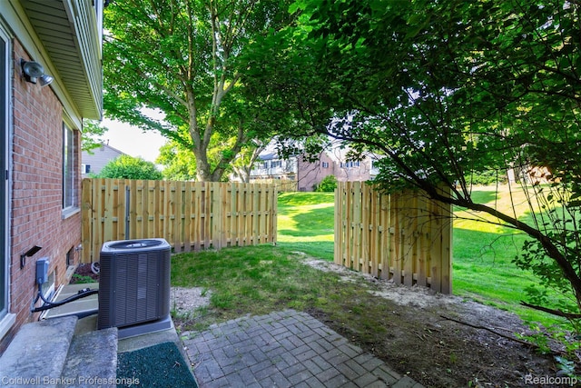 3531 Burbank Dr, Ann Arbor, MI 48105 - view of yard featuring central air condition unit and a patio