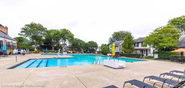 3531 Burbank Dr, Ann Arbor, MI 48105 - community pool featuring a patio area