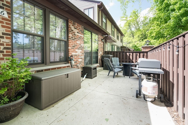 39596 Old Dominion Dr, Clinton Township, MI 48038 - view of patio with a fire pit, fence, and grilling area