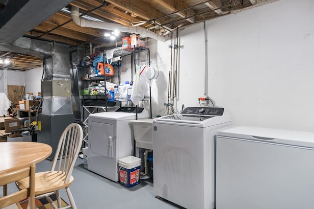 39596 Old Dominion Dr, Clinton Township, MI 48038 - laundry room featuring washer and clothes dryer