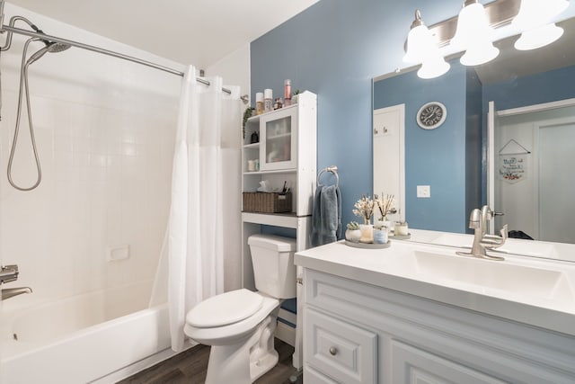 39596 Old Dominion Dr, Clinton Township, MI 48038 - bathroom featuring toilet, wood finished floors, vanity, and shower / tub combo
