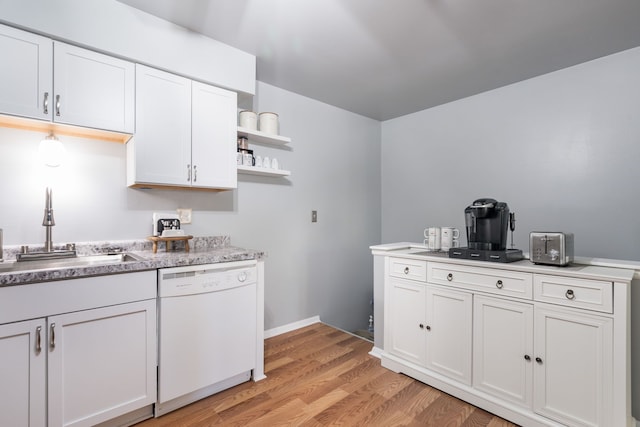 39596 Old Dominion Dr, Clinton Township, MI 48038 - kitchen with dishwasher, a sink, open shelves, light wood finished floors, and white cabinetry