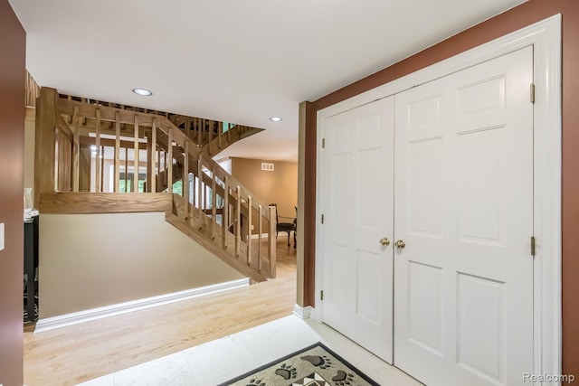 4076 Cross Rd, White Lake, MI 48386 - tiled foyer with stairway, recessed lighting, and baseboards