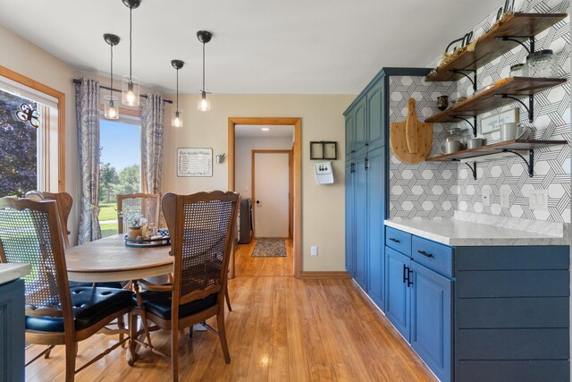 7918 Dan Patch Dr, Jackson, MI 49201 - dining room with light wood-style floors and baseboards
