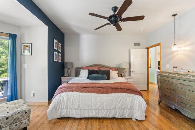 7918 Dan Patch Dr, Jackson, MI 49201 - bedroom with wood finished floors, baseboards, and a ceiling fan