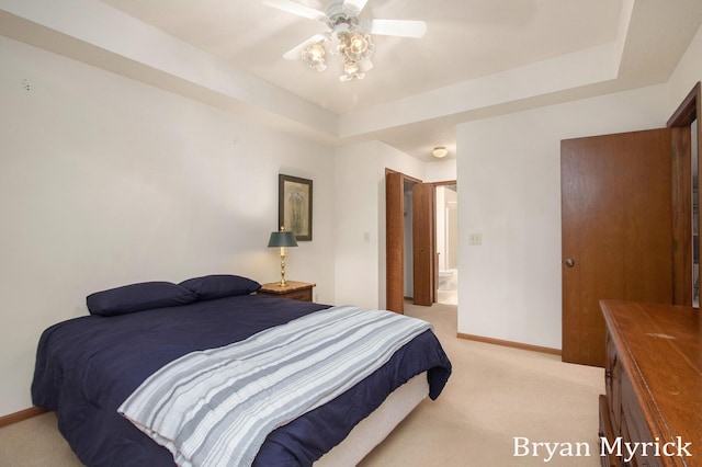 607 Crestview St, Holland, MI 49423 - bedroom with light colored carpet, baseboards, and a tray ceiling