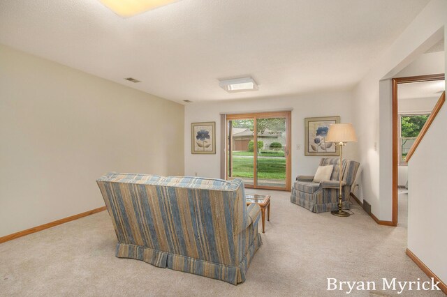607 Crestview St, Holland, MI 49423 - living area with light colored carpet and baseboards