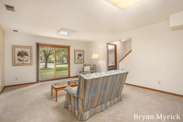 607 Crestview St, Holland, MI 49423 - carpeted living room featuring baseboards