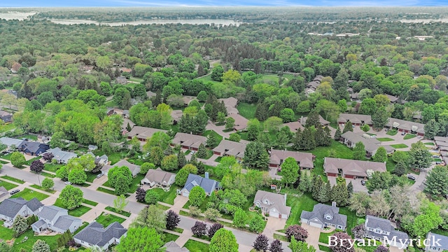 607 Crestview St, Holland, MI 49423 - aerial view of residential area with a heavily wooded area