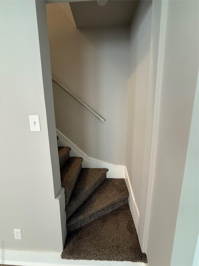 816 12th St, Port Huron, MI 48060 - staircase featuring carpet