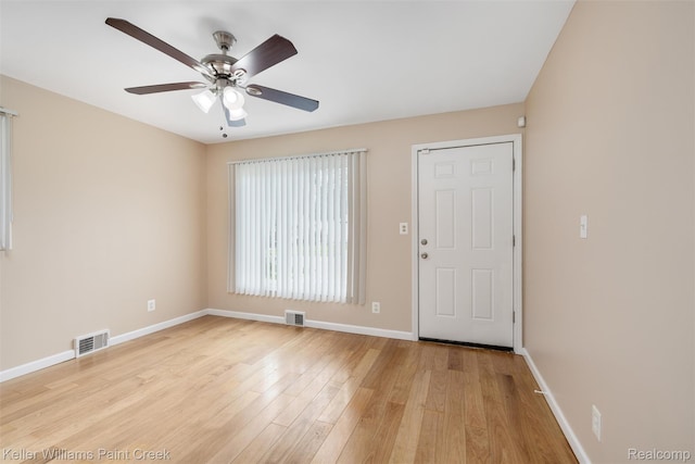 12777 Sherman Ave, Warren, MI 48089 - entryway featuring baseboards, ceiling fan, and light wood-style flooring