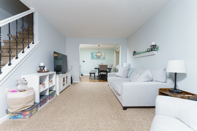 living area with stairs, carpet floors, and baseboards