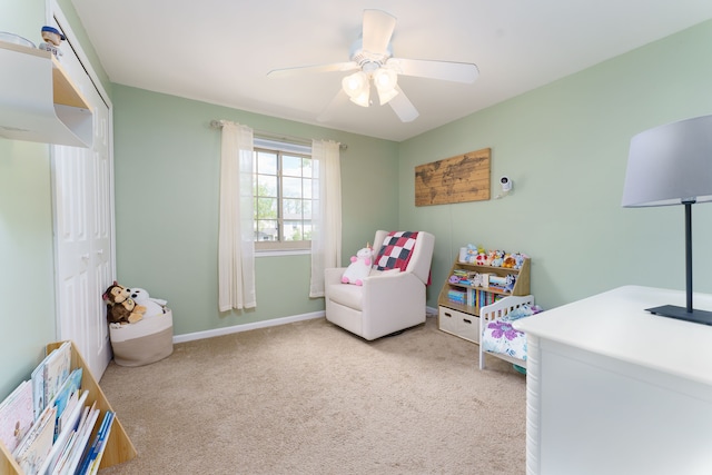 carpeted bedroom featuring ceiling fan, baseboards, and a closet