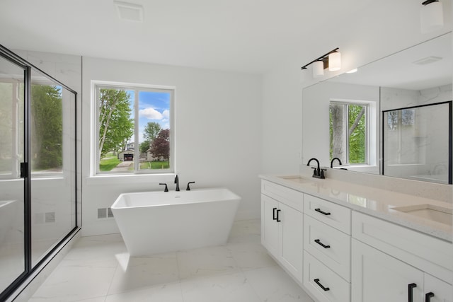 47309 Jefferson Ave, Chesterfield, MI 48047 - full bath featuring plenty of natural light, a shower stall, a freestanding tub, and double vanity