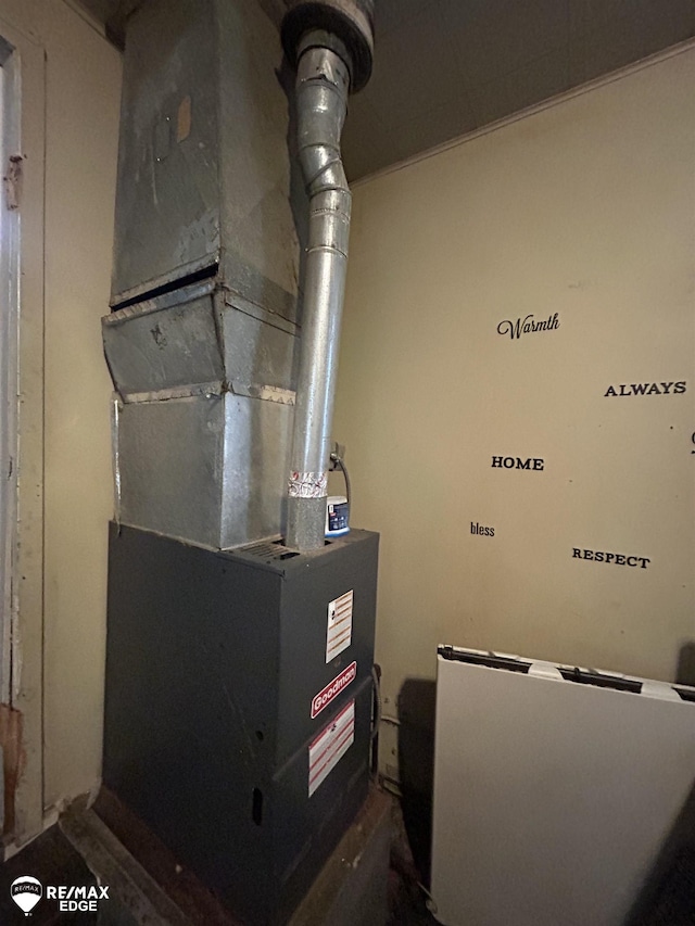 1634 Delaware St, Saginaw, MI 48602 - utility room with heating unit