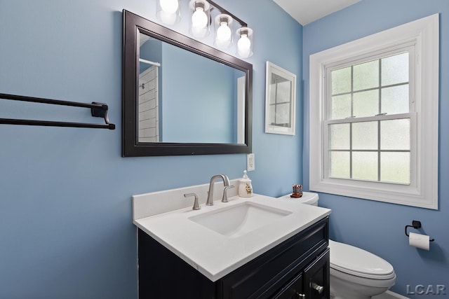 2369 Airport Rd, Adrian, MI 49221 - bathroom featuring toilet and vanity