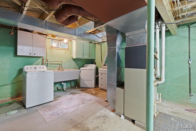 2369 Airport Rd, Adrian, MI 49221 - unfinished basement with washing machine and dryer and a sink