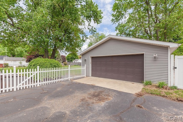 2369 Airport Rd, Adrian, MI 49221 - detached garage with fence