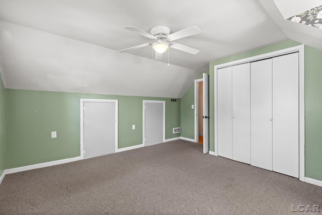 2369 Airport Rd, Adrian, MI 49221 - additional living space with vaulted ceiling, carpet floors, baseboards, and a ceiling fan
