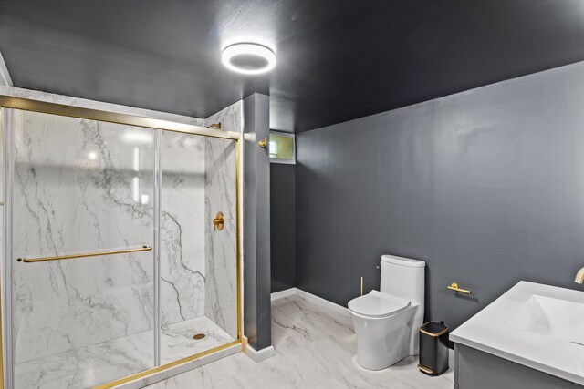 bathroom with marble look tile flooring, a marble finish shower, toilet, vanity, and baseboards