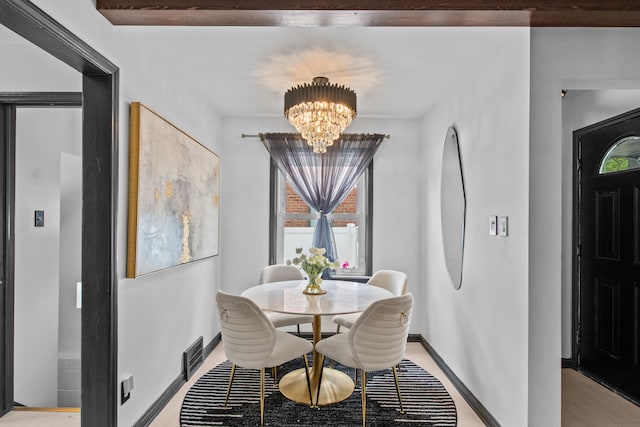 dining room with a chandelier