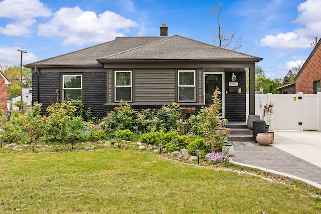 view of front of house featuring a chimney