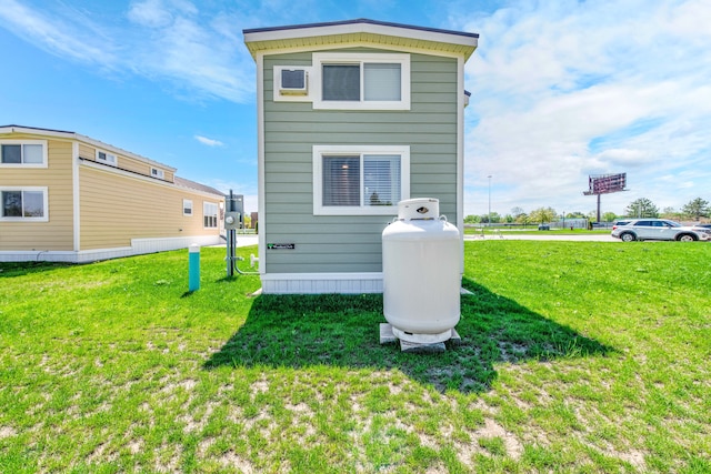 2301 Water St, Port Huron, MI 48060 - rear view of house with a lawn