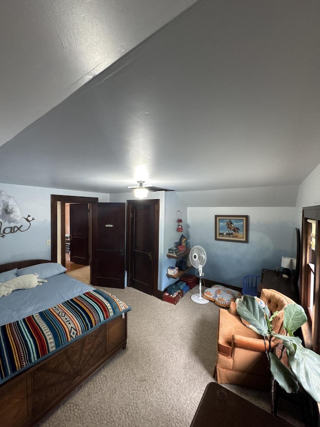 701 Chestnut St, Grayling, MI 49738 - bedroom with carpet and vaulted ceiling