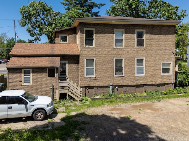 447 W Vine St, Kalamazoo, MI 49001 - rear view of house with brick siding