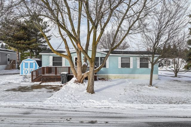 25 Hunters Rill, Lapeer, MI 48446 - manufactured / mobile home featuring a shed and an outbuilding