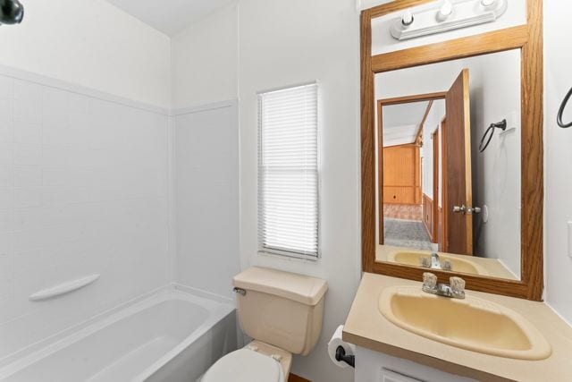 25 Hunters Rill, Lapeer, MI 48446 - bathroom with vanity, toilet, and bathtub / shower combination
