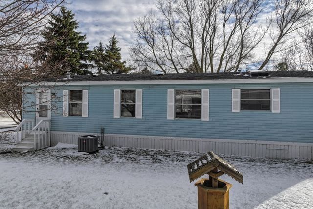 25 Hunters Rill, Lapeer, MI 48446 - snow covered property featuring central air condition unit