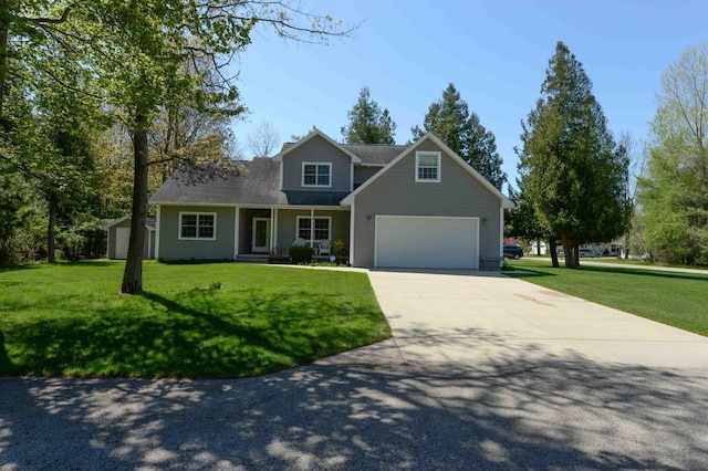 722 Bennington St, East Tawas, MI 48730 - traditional-style house with driveway, a front yard, a shed, and covered porch