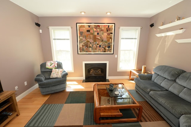 722 Bennington St, East Tawas, MI 48730 - living room featuring light wood finished floors, recessed lighting, and baseboards