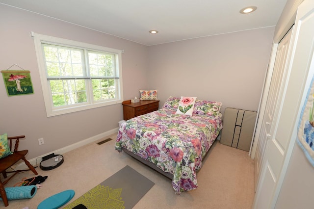 722 Bennington St, East Tawas, MI 48730 - bedroom featuring carpet, baseboards, and recessed lighting