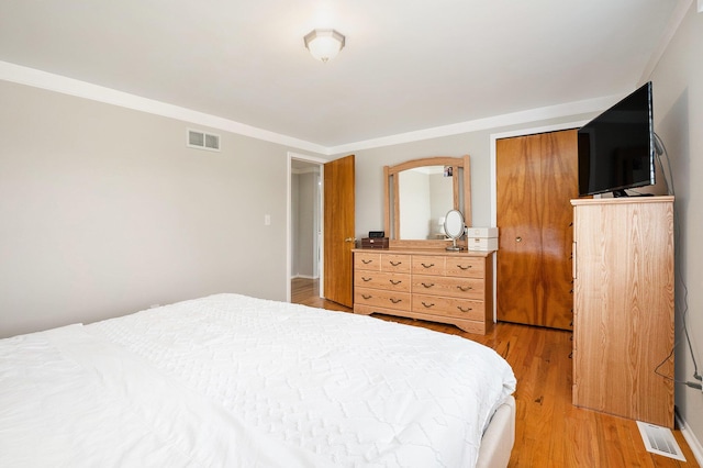 bedroom with light wood-style floors