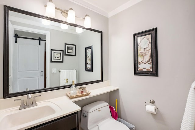 bathroom featuring toilet and vanity