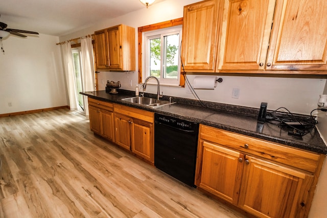 789 W Castle Rd, Fostoria, MI 48435 - kitchen featuring black dishwasher, a sink, light wood-style floors, a ceiling fan, and brown cabinetry