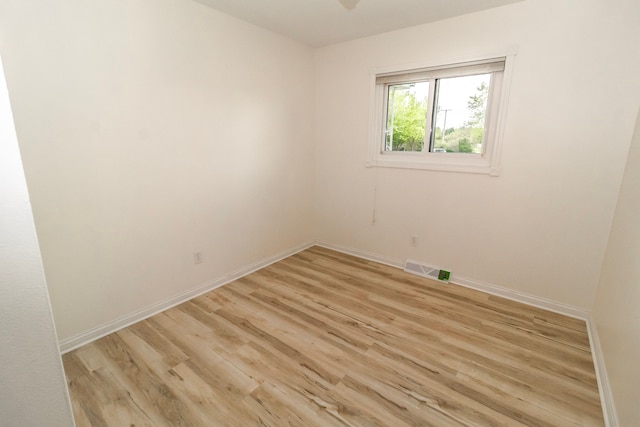 789 W Castle Rd, Fostoria, MI 48435 - spare room with light wood-style floors and baseboards